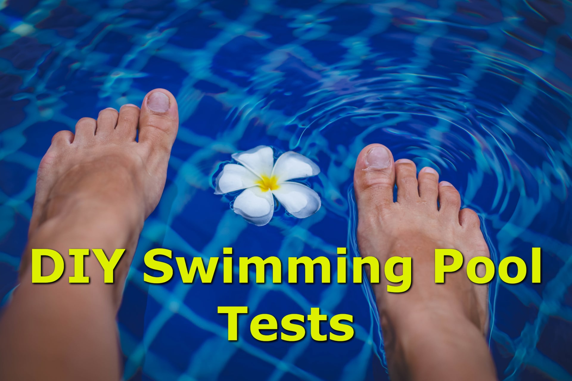 Feet in a clean swimming pool with a floating flower