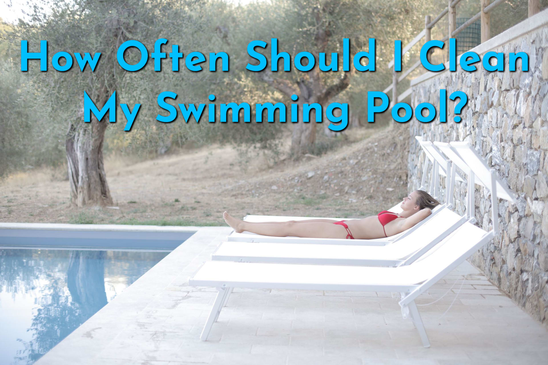 Woman in a red bikini laying poolside wondering "Should I Clean My Pool?"